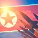 Shockwaves as Kim Ju Ae Steps Into the Spotlight North Korean flag with missile silhouettes