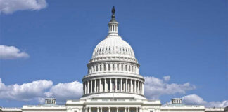 US Capitol building against blue sky