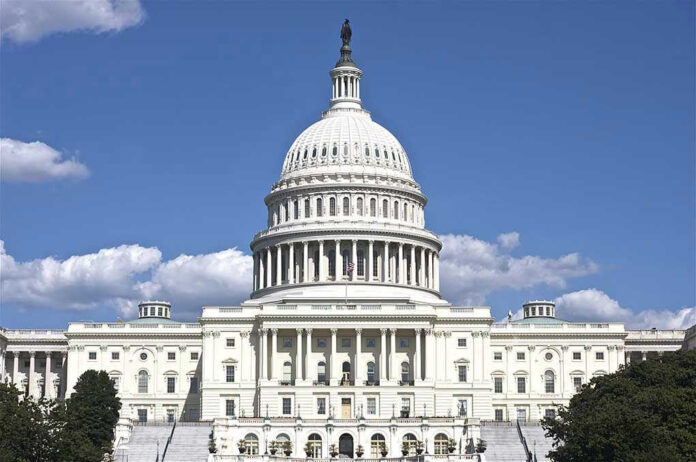 US Capitol building against blue sky