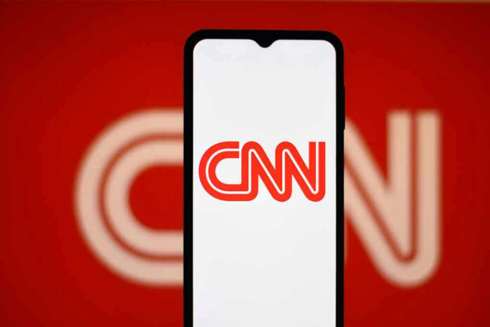 2442890737 CNN logo on a phone screen