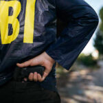 FBI SCANDAL: Informant or SERIAL KILLER?! FBI agent holding a gun behind the back