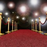 Rowling UNLEASHES on Watson—Hollywood Stunned A red carpet lined with gold stanchions and ropes under bright spotlights