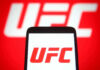 UFC logo on phone screen and background