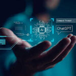 Shocking Malware Surge Targets Phones Hand holding digital AI and ChatGPT graphics.