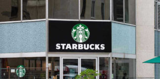 Starbucks storefront with glass doors and logo