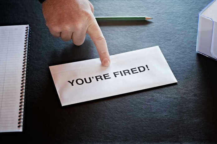Envelope with YOURE FIRED! and pointing finger.