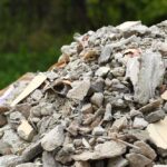 Trump’s Bold Plan to Erase ‘Biden Filth’ A large pile of construction debris consisting of broken concrete and other materials