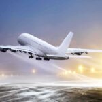 6000 Airbus A320 Recalled — Nightmare for Holiday Travelers An airplane taking off from an airport runway against a twilight sky