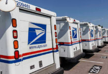 USPS DEFIES Federal Safety Rules – WOW! Row of USPS mail delivery trucks parked.