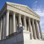 Clarence Thomas Unveils Shocking Bias Exterior view of the Supreme Court building with columns and a statue of justice