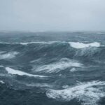 Deadly ROGUE Wave KILLS—Tourists Swept Away Rough ocean waves under a cloudy sky