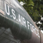 Billion-Dollar Bomber Gets Radical Upgrade U.S. Air Force plane with trees in background.