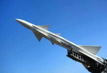 U.S. Army missile against a clear blue sky.