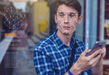 Disneyland’s $5M Privacy Battle: What GUESTS Didn’t KNOW! Young man using a smartphone with face recognition overlay