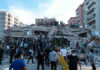 Trump Presses Israel on Lebanon Civilian Harm People at a collapsed building after an earthquake.