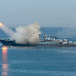 Retaliation Talk Grows After Mysterious Loss Warship firing missile in the sea.