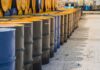 U.S. Eyes Iran Oil Asset in High-Stakes Gamble Rows of oil barrels in a storage facility