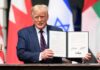 Presidential Interview Ends in Clash A man holding a signed document during a diplomatic event