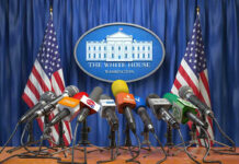 Trump Links Personal Security to Massive Military Response Multiple microphones at White House press briefing podium.