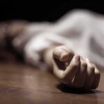 hand of a person lying on the floor