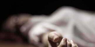 hand of a person lying on the floor