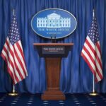 White House press podium with microphones and two American flags