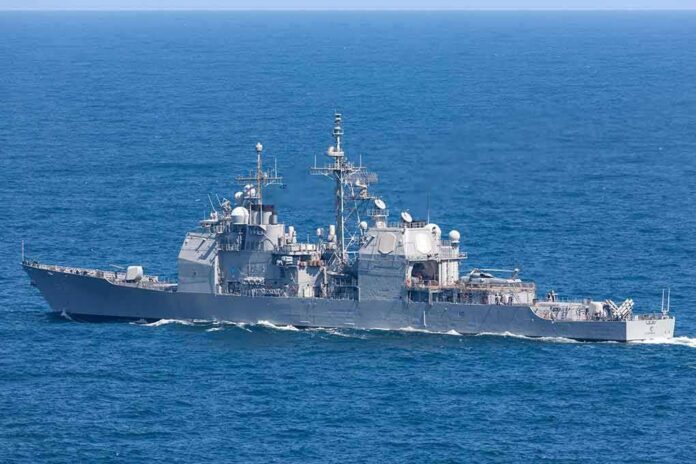 shutterstock_1408246997-2 Gray naval warship cruising on open sea