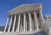 140 Missed Votes.: One Explosive Return to Congress. The Supreme Court building featuring grand columns and statues under a clear blue sky