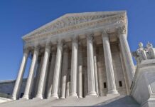 140 Missed Votes.: One Explosive Return to Congress. The Supreme Court building featuring grand columns and statues under a clear blue sky