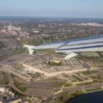 Homeland First: New Army Plan Puts Readiness First airplane wing over a sprawling government complex