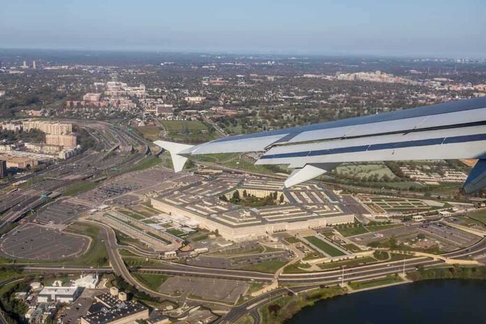 shutterstock_1008130015 airplane wing over a sprawling government complex