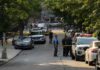 Upper East Side Co-Op Stabbing Leaves Woman Hospitalized Police officers secure a residential street with patrol cars and yellow tape