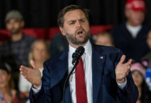 750,000 ACA Enrollees Face Removal Man in suit speaking at a podium