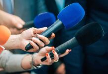 Rookie Pitcher Throws Immaculate Inning Reporters holding colorful microphones