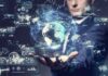 AI Race Intensifies as Calls for a Slowdown Grow Businessperson holding a digital globe with data interfaces