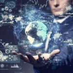AI Race Intensifies as Calls for a Slowdown Grow Businessperson holding a digital globe with data interfaces