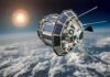 Satellite with solar panels orbiting above Earth’s clouds