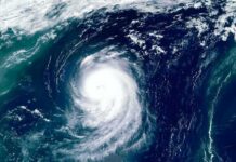 Satellite view of a powerful hurricane swirling over the ocean