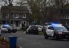 Mystery Nude Rider Dodges Police Again Police SUVs with lights on block a suburban street