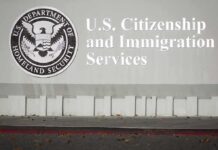 USCIS building sign with DHS seal