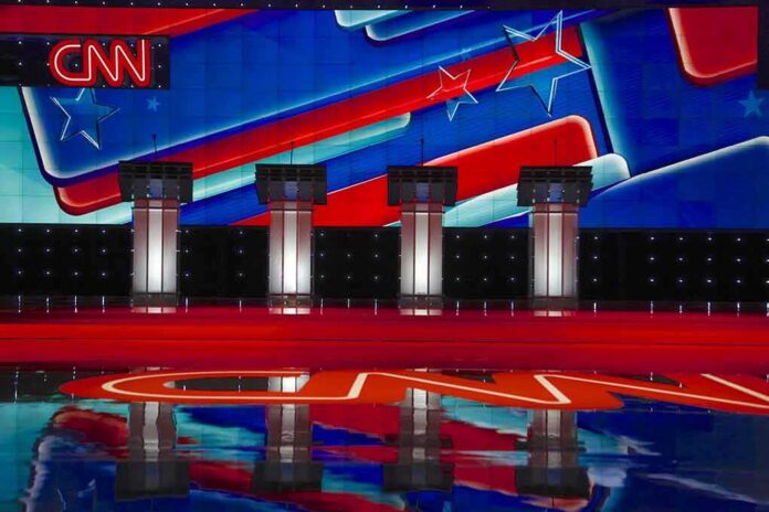 shutterstock_353120129-1 Debate stage with four podiums and colorful star backdrop