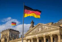 Germany’s CDU Faces a Major Setback German flag flying above the Reichstag building