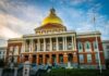 NJ Lt. Governor Faces Resignation Demand Massachusetts State House with golden dome and columns