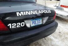 Minneapolis Divided Over Driverless Cars Rear of Minneapolis police car with Minnesota license plate