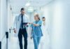 Four Days After Surgery, Pope Leo XIV Returns to Vatican Doctor and nurse walking in a hospital corridor reviewing a tablet
