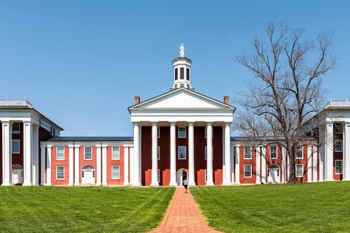 shutterstock_1224545683-1 Neoclassical red-brick college building with white columns and cupola
