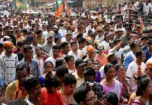 130 Million Names Cut From India’s Draft Rolls Crowd at a political rally with Kumar Gandharva, Ritu Rani, Jersson Vásquez, Mamata Banerjee, Pravin Amre, Sumrai Tete, Rangana Herath, and Gerson Torres