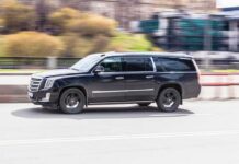 Prosecutors Investigate Alleged ICE Vehicle Strike Black SUV driving on city street