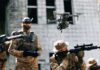 Congo Ambush Leaves 20 Casualties Quadcopter drone flying above soldiers in camouflage